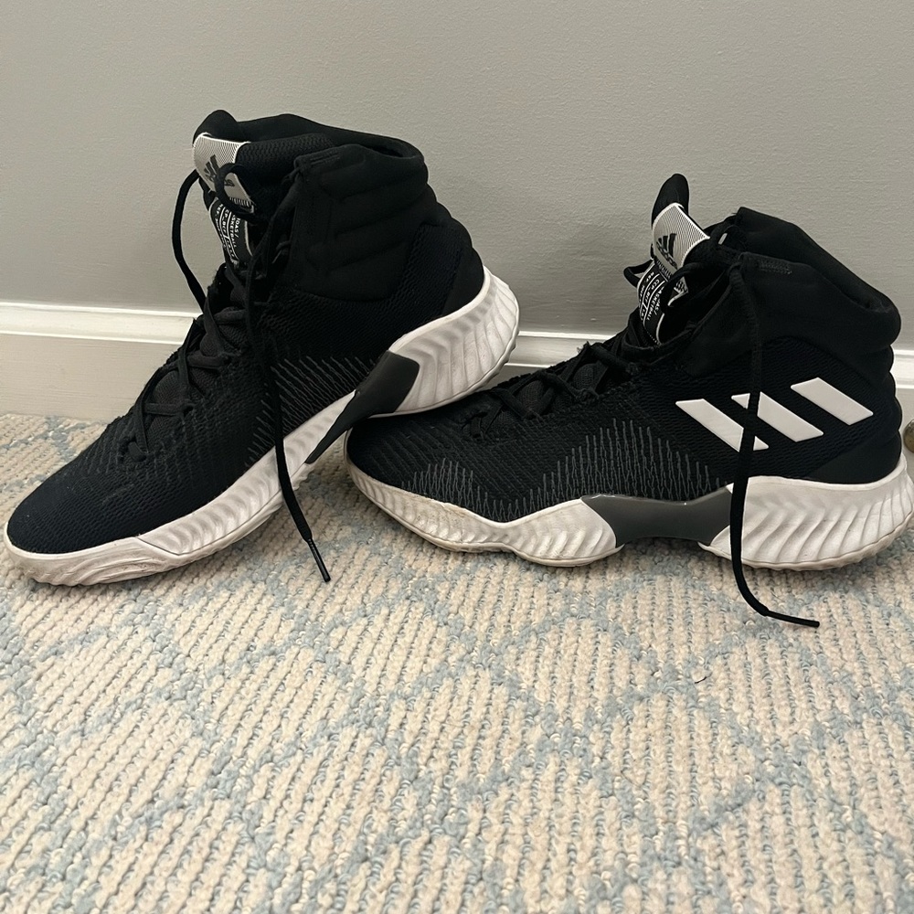ADIDAS black basketball shoes. Mens 8.5, woman’s 10.
